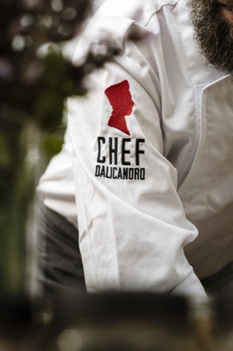 Detail of the chef jacket featuring the official Chef Dalicandro brand logo