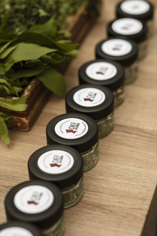 Glass jars of Bomboniere Espresse by Chef Dalicandro ready for wedding guests