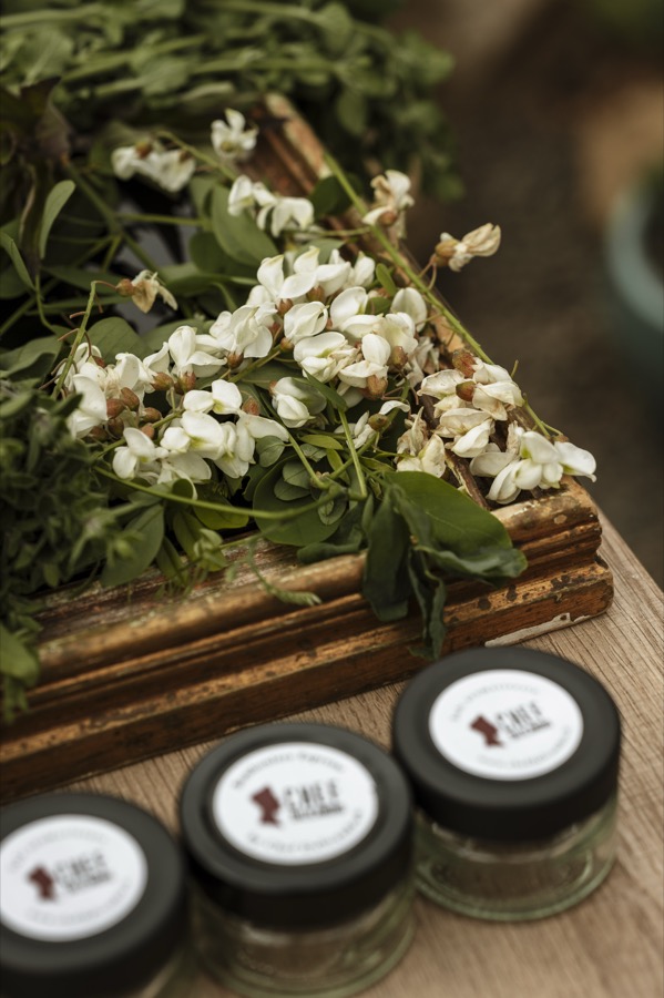 Station styling with white flowers and Bomboniere Espresse glass jars